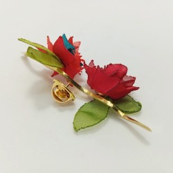 Pin Botón doble en rama rojos y turquesa