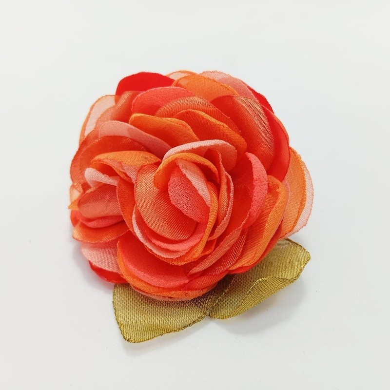 Pin Carmen flor grande naranjo coral