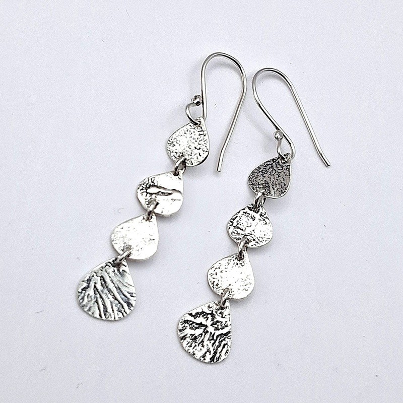 Aros étnicos gotas textura plata